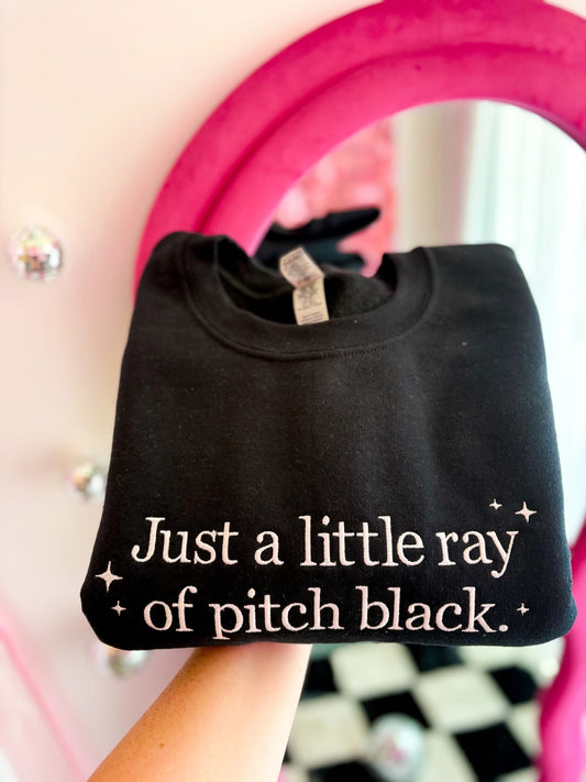 “Just a little ray of pitch black” Crewneck